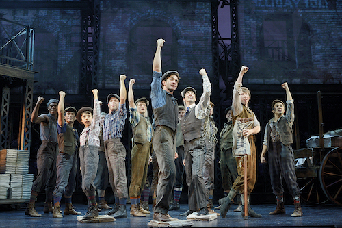 Photo of Dan DeLuca (center) and the original North American Tour company of NEWSIES by Deen van Meer.