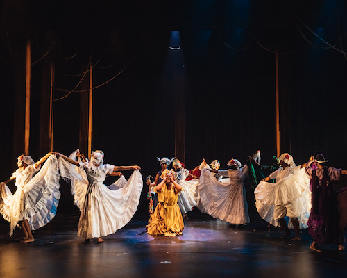 Nicole Brooks with the company of Obeah Opera. Photo by Jeremy Mimnagh.