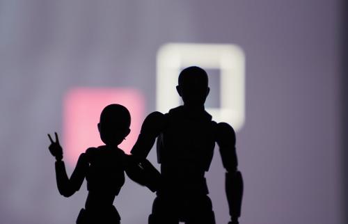 photo silouette of 2 artist mannequins advertising No Foreigners playing at The Theatre Centre Toronto