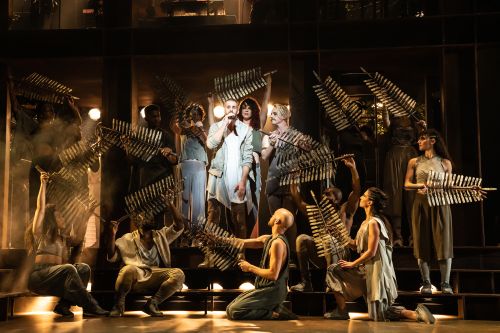 people kneeling around "jesus" in Jesus Christ Superstar